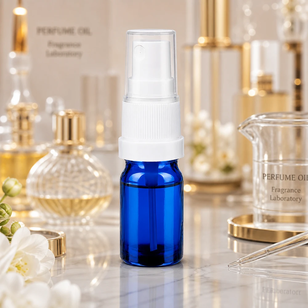 Premium 5ml Sprayflasche in Kobaltblau mit feinem Sprühnebel für professionelle Dosierung
